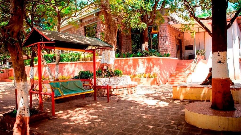 Adamo Matheran - Village - outdoor common area at our hotel in Matheran