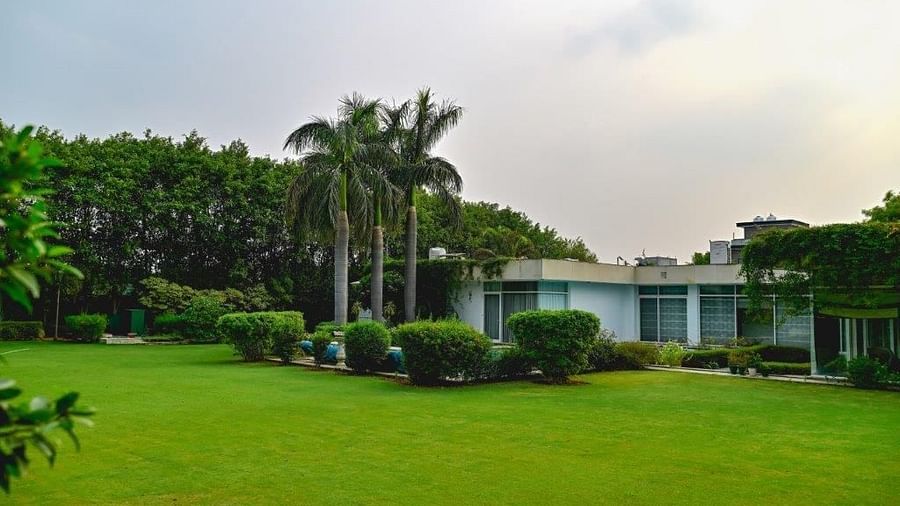 Shot of the expansive green lawn outside our villa where you can host events | Udman Luxe Villa
