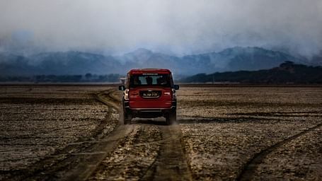 An image of a car in a desert region