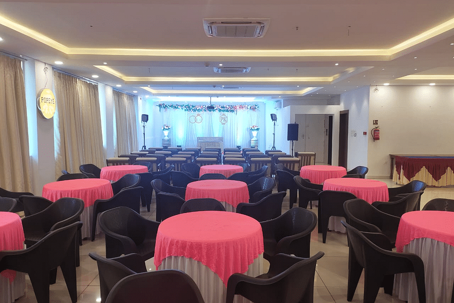 Image of chairs and tables at a conference hall at Vagator Downtown, Goa