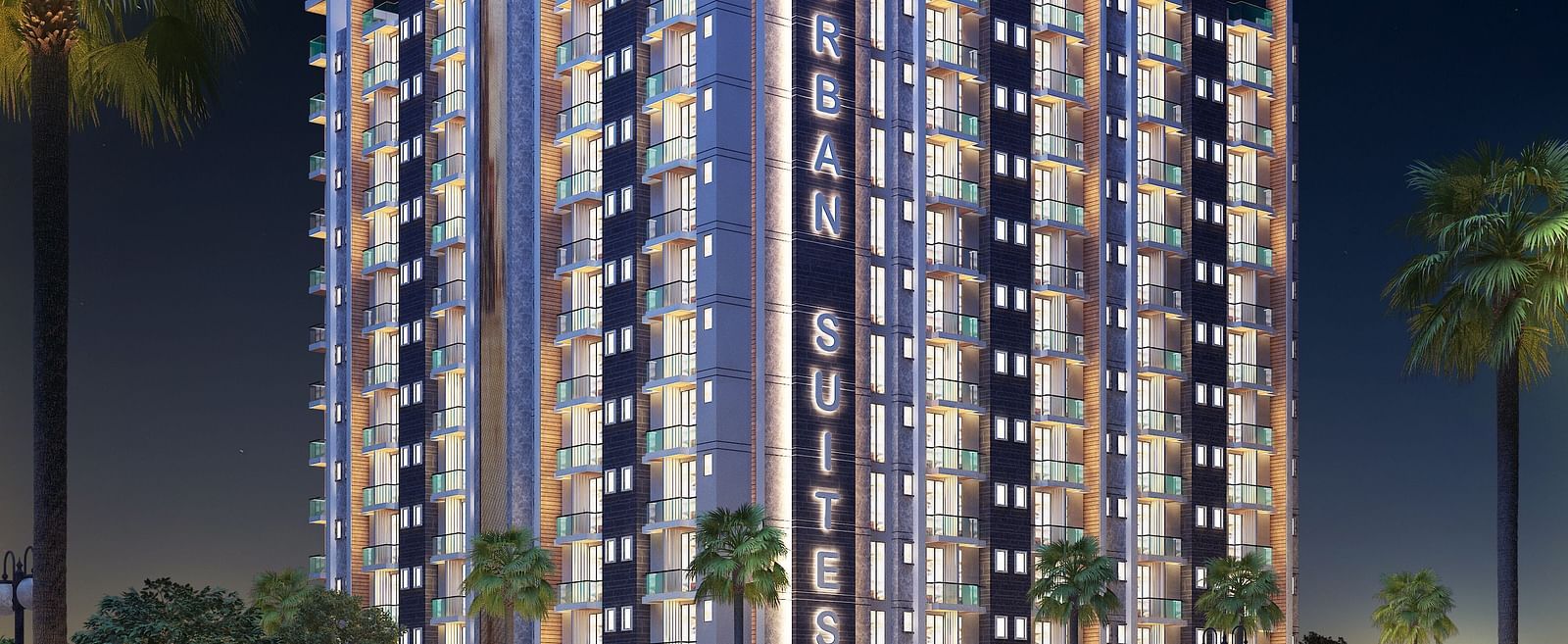 Facade view of Urban Suites by BluSalzz, Jaipur against the night sky, with the building glowing beautifully in the evening light.