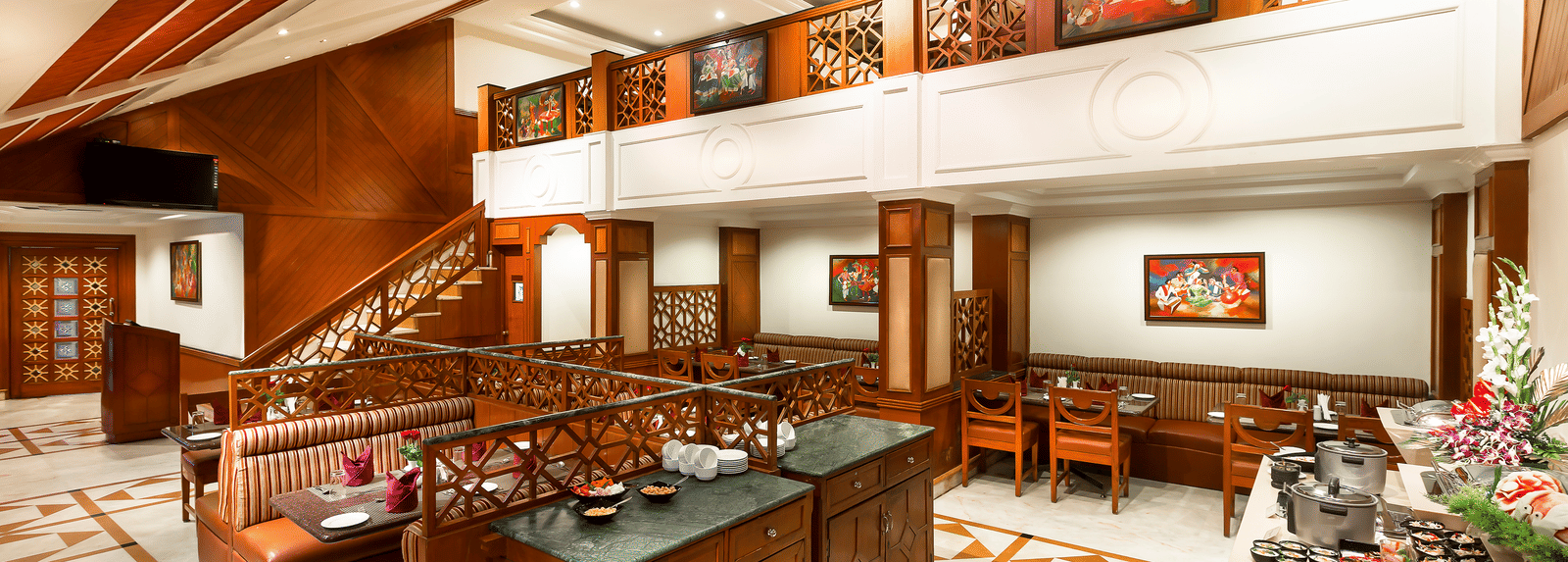 The seating arrangement of Dakshin Restaurant - Images of Regency Kanchipuram by GRT Hotels.
