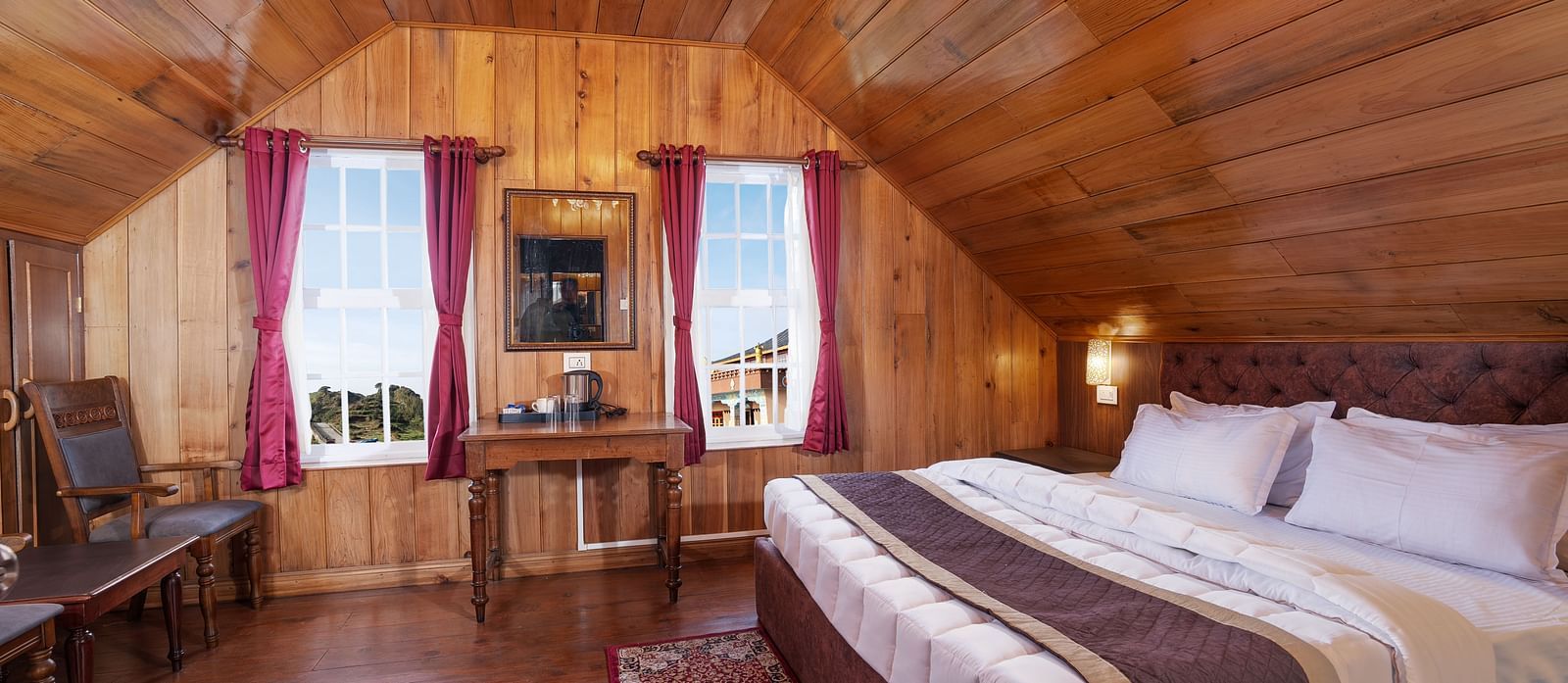 A room at Poshtel, Meghma with a double bed