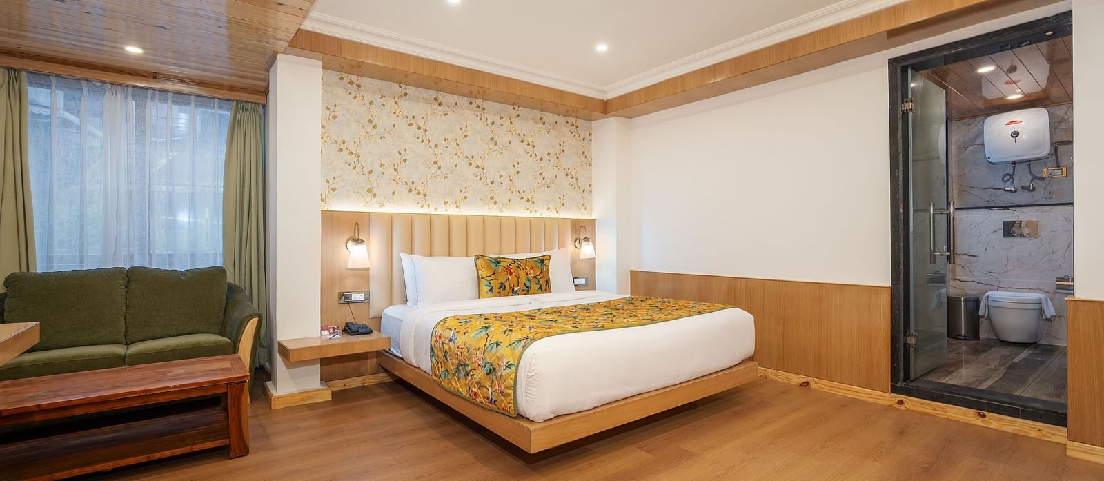 view of a king size bed of a Premium Room at Summit Grand Resort & Spa