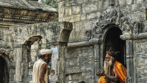 sadhus on temple ruins