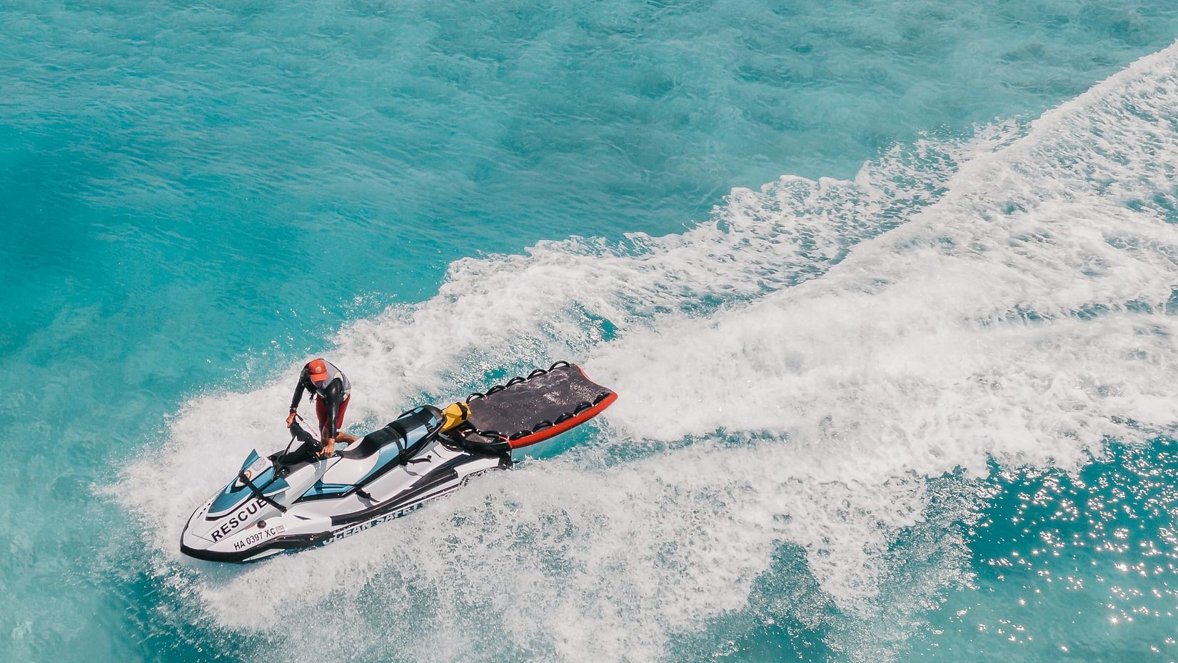 A person jetskiing in the sea