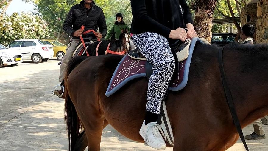 An image of a man riding a horse - Utsav Camp Sariska