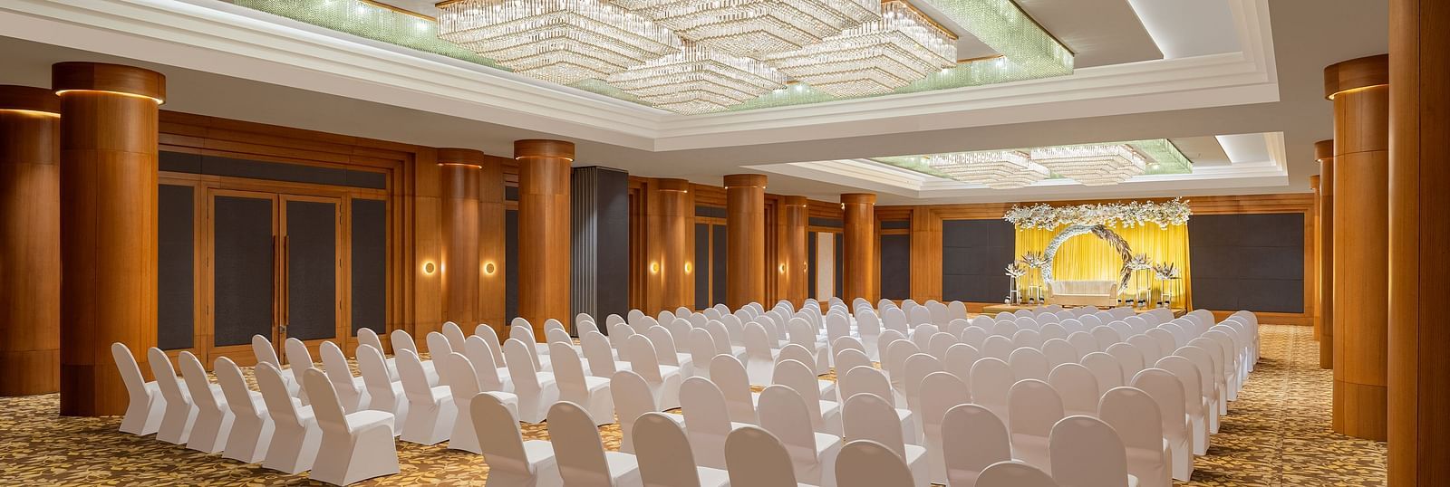 Seating arrangement in Orchid Hall at Essentia Luxury Hotel, Indore