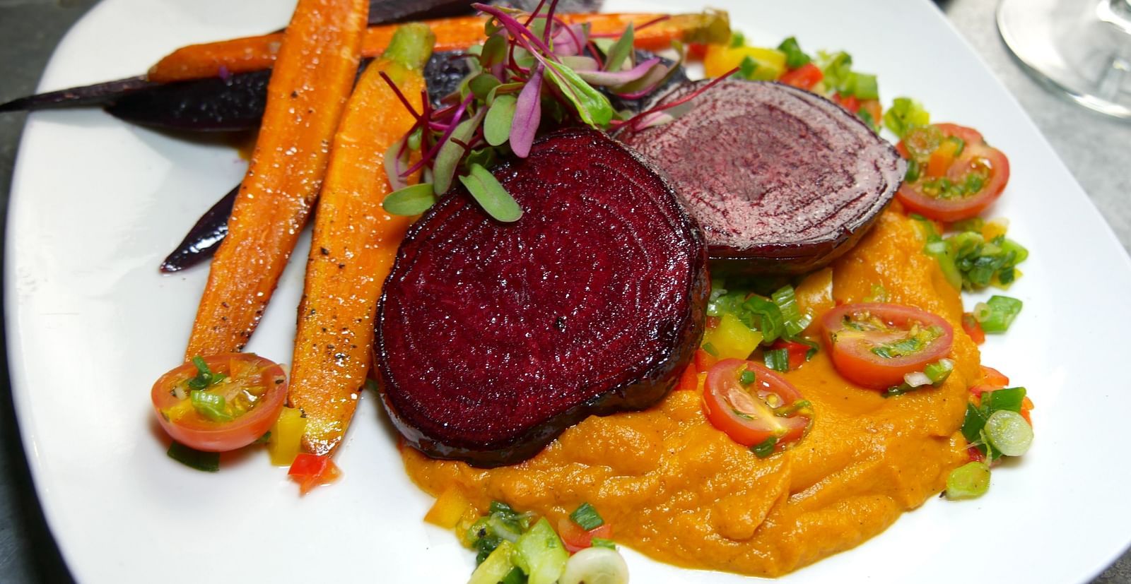 Pumpkin mash being served with sauteed vegetables - The Groveland Hotel.