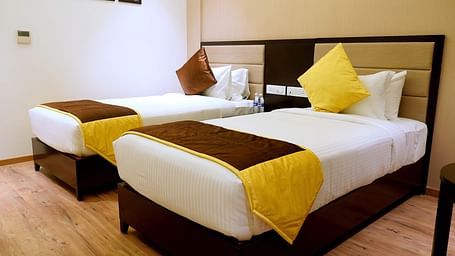 view of twin beds of Premium Twin Room of ASR Parklane, Hosur