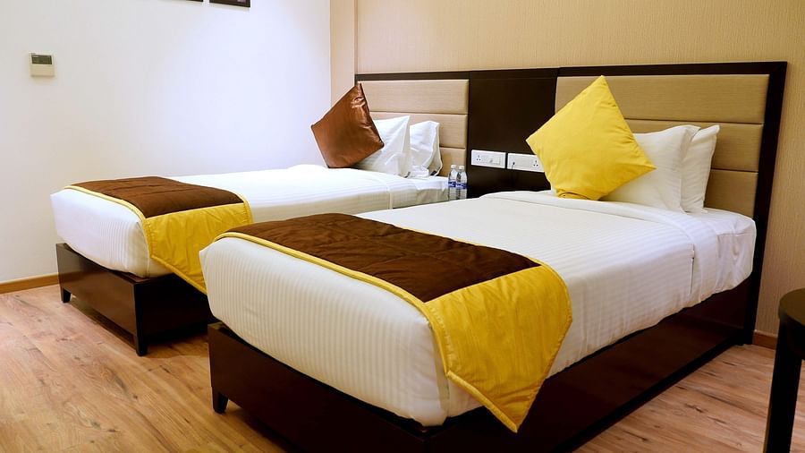 view of twin beds of Premium Twin Room of ASR Parklane, Hosur