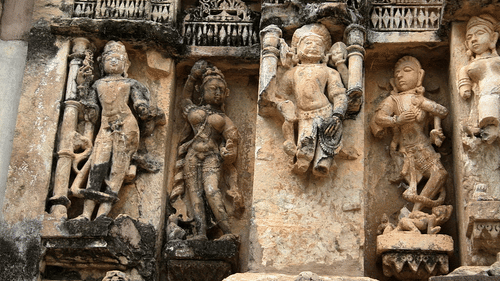 Stone figures sculpted on the walls of Neelkanth Temple, one of the places to visit in Alwar