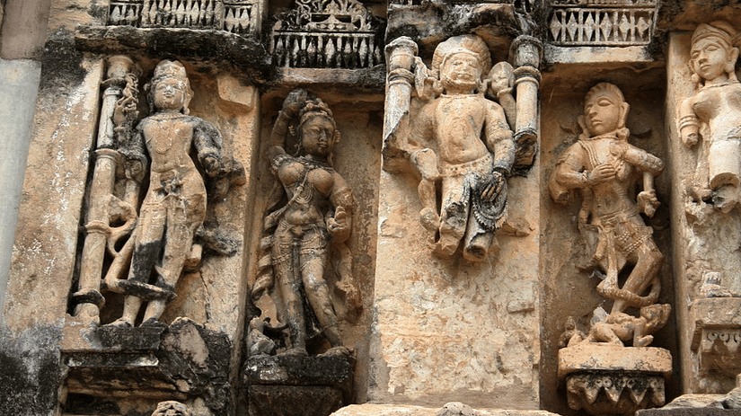Stone figures sculpted on the walls of Neelkanth Temple, one of the places to visit in Alwar