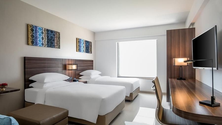 Twin Room with two bed overlooking the pool at The Residency Towers Rameswaram