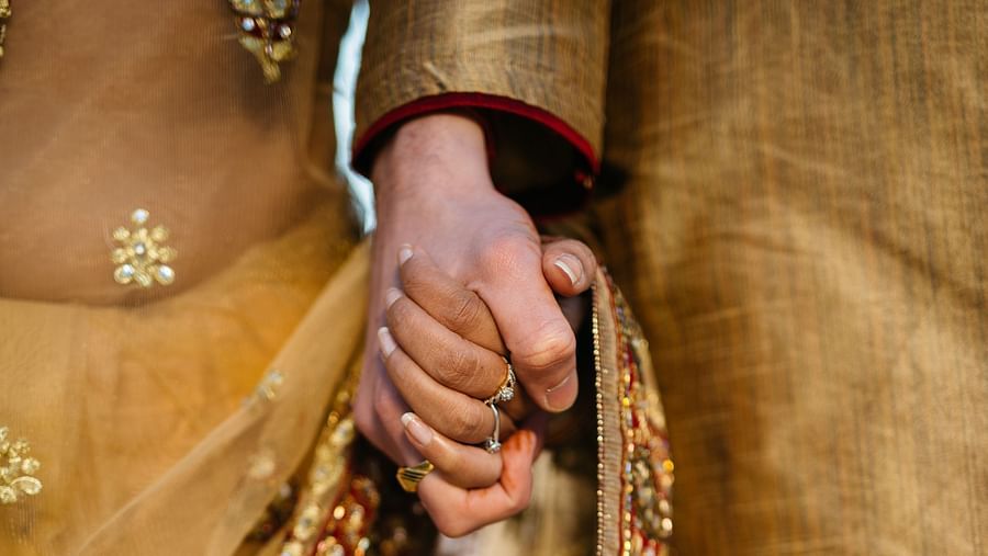 A couple holding hands