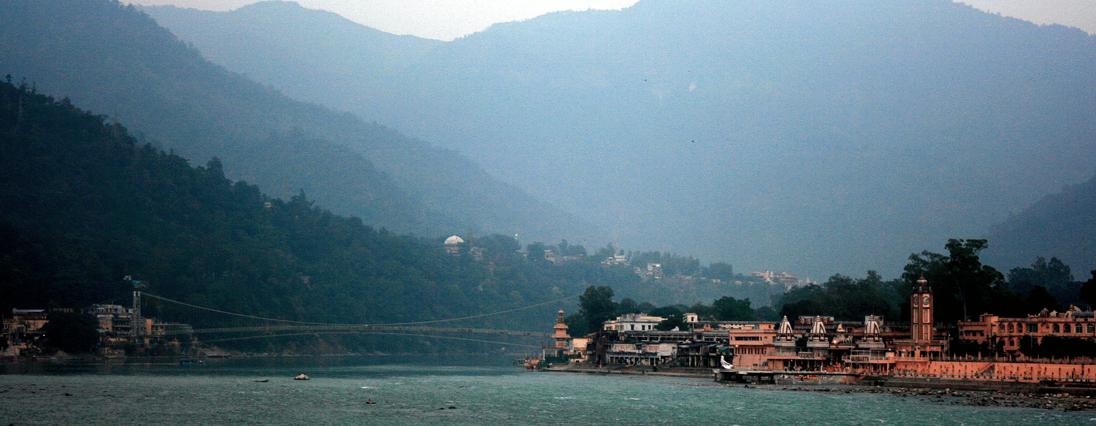 Picture featuring a Lake with mountains in the background.