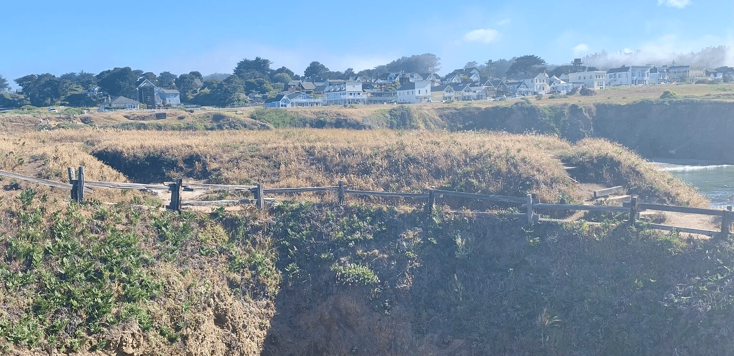 A hole in the middle of a vast landscape 