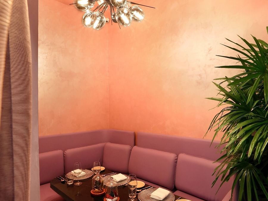 The Empresa Boutique Hotel - a corner sofa seat at White Charcoal restaurant in Andheri