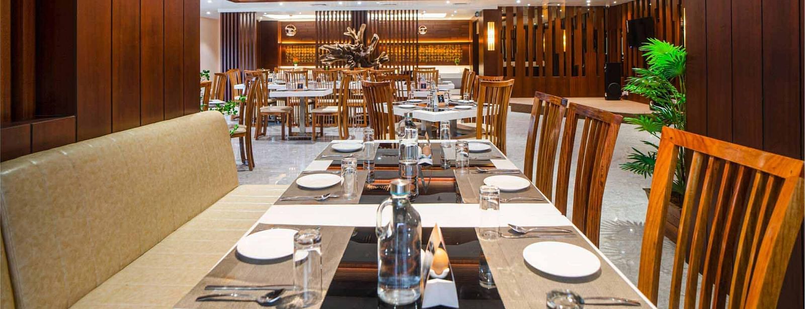 A neatly set table in the dining area of Mansha Palace in Port Blair is ready for guests.
