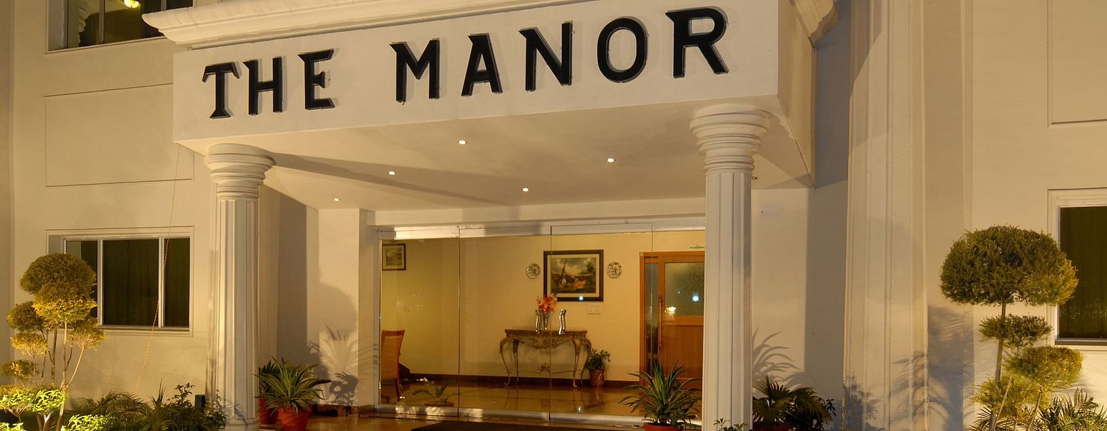 Facade image of The Manor showcasing the entrance.