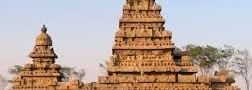 The exterior view of the Shore Temple, showing detailed stone carvings and towers.