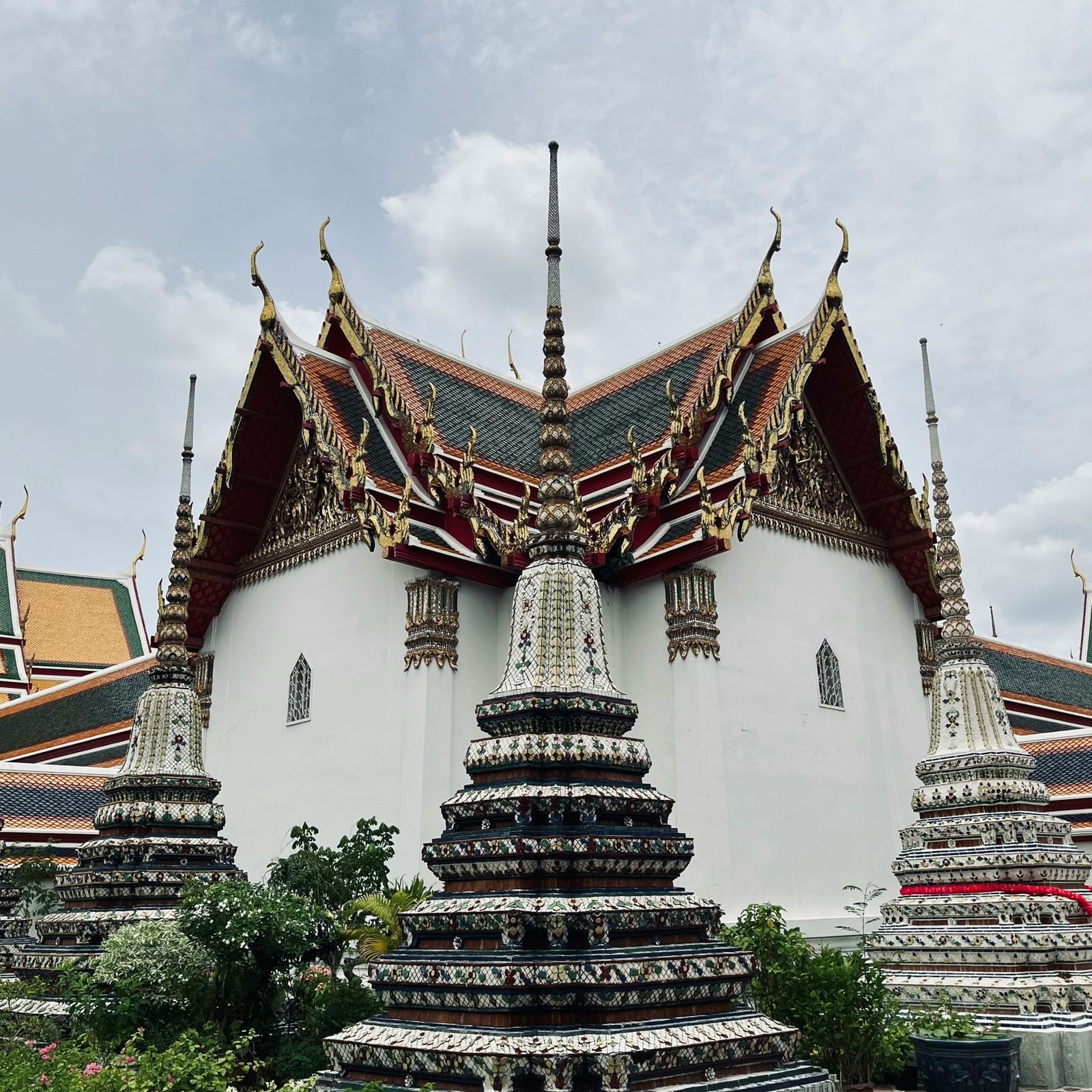 A view of a monastery's facade with traditional architecture and intricate detailing.