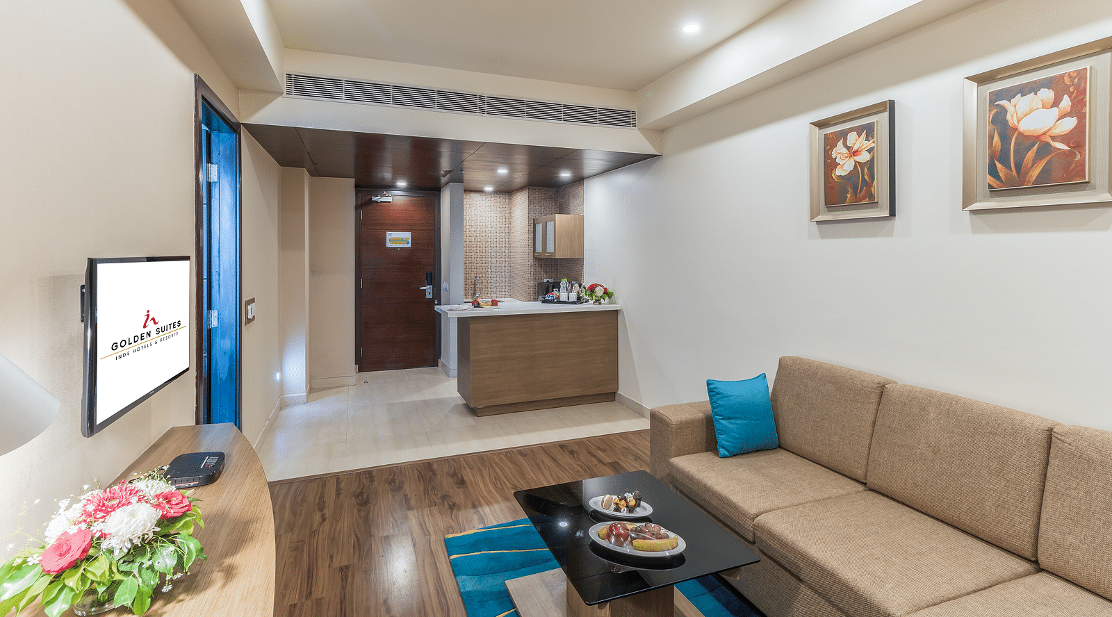 Suite Living room with comfy sofa at Golden Suites