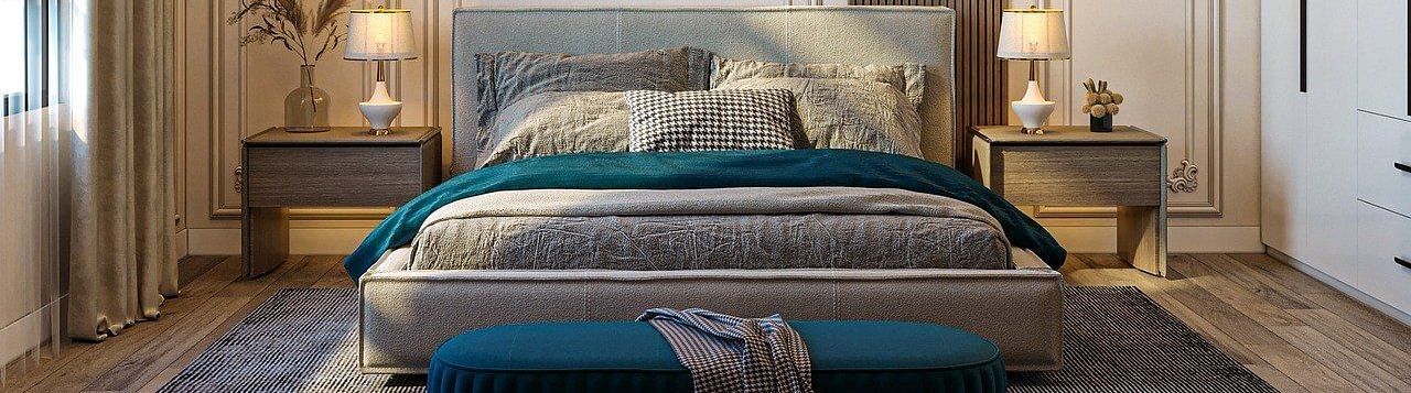 Luxurious bedroom with a king size bed, curtains, and designer lighting.