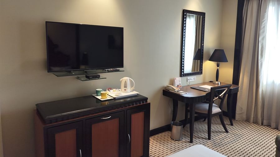  Luxurious hotel EXECUTIVE  ROOM at St Marks Hotel with bright lighting and sophisticated seating area
