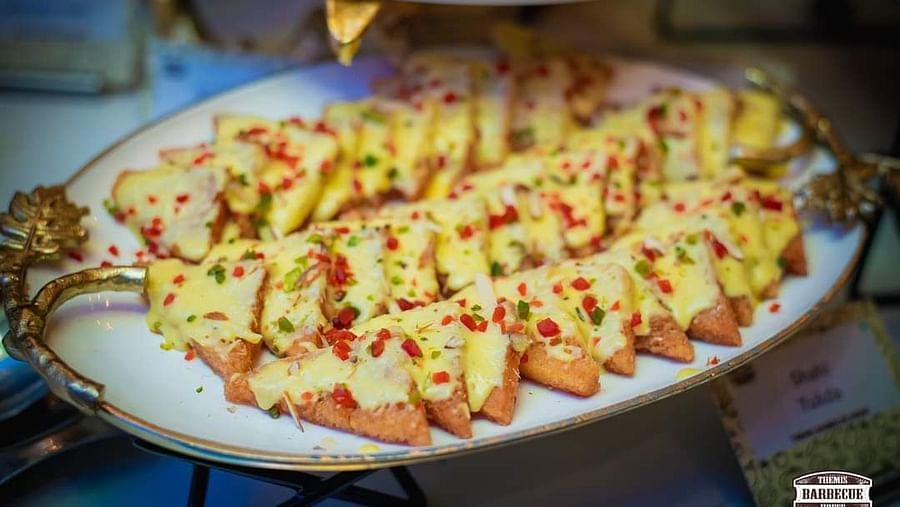 An image of snacks served on a platter at Themis Barbecue House, NSP Pitampura