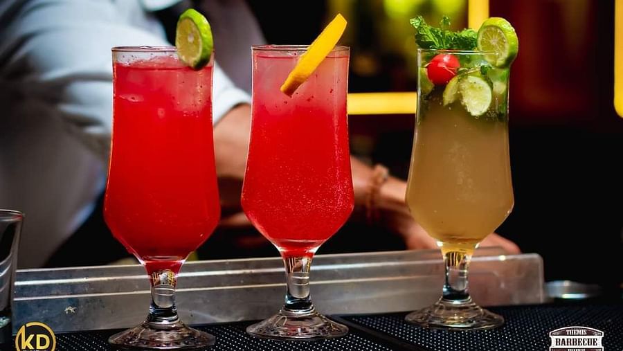 An image of a glass drinks placed on a table at Themis Barbecue House, Panipat