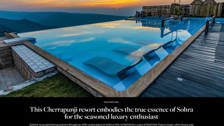 Online destinations feature on a Cherrapunji Sohra resort, illustrated with a sunset photo of an infinity pool, wooden deck, and timber cabanas.
