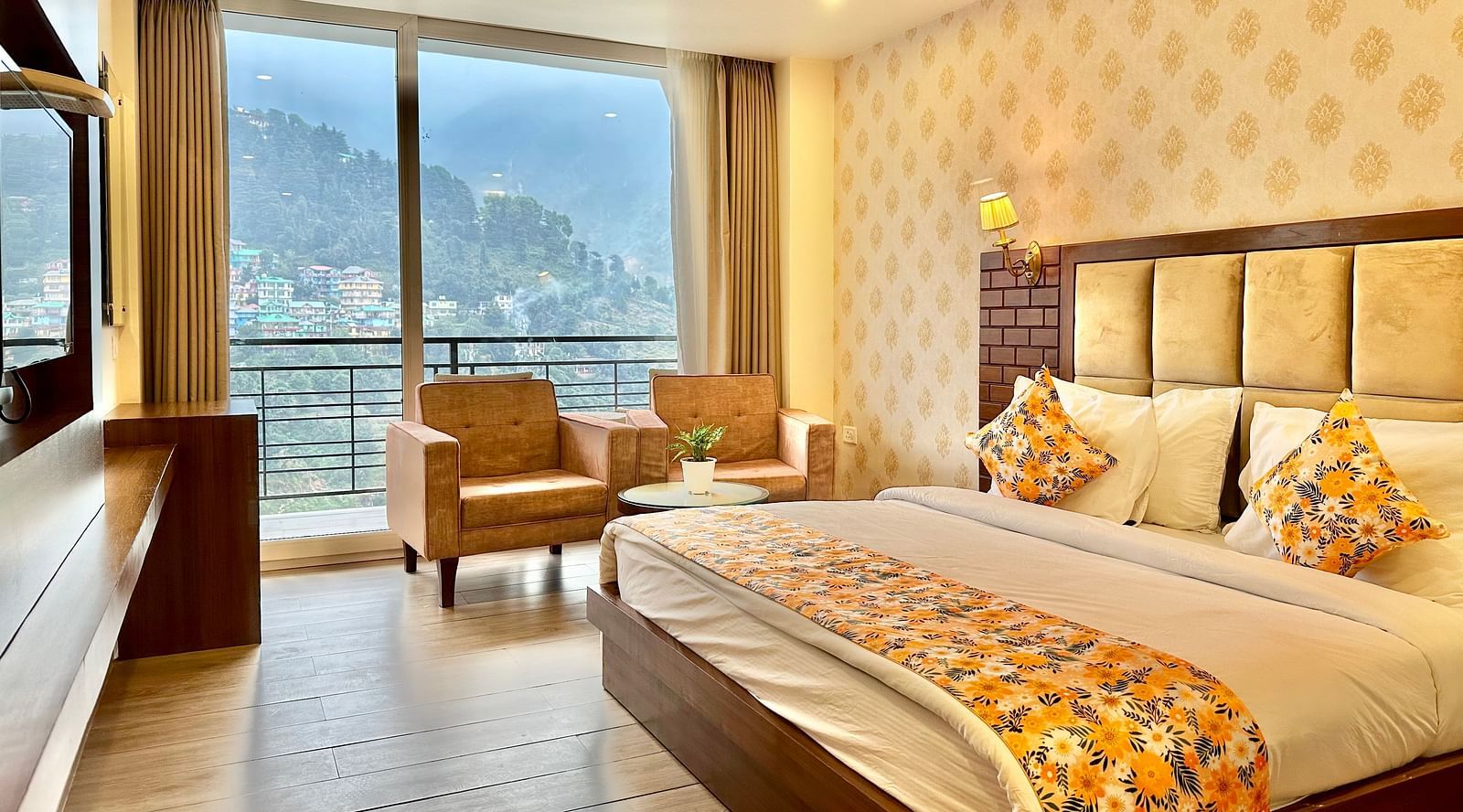 image of the premium room with balcony highlighting a beautiful mountain views from the huge windows - ZENQ SIGNATURE INN, MCLEODGANJ