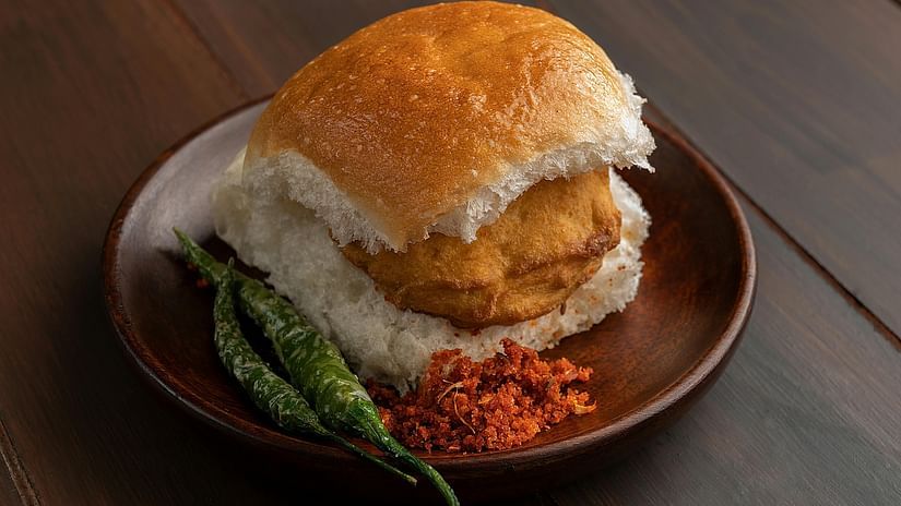 Potato friiters stuffed between buns  and served with salted chilli