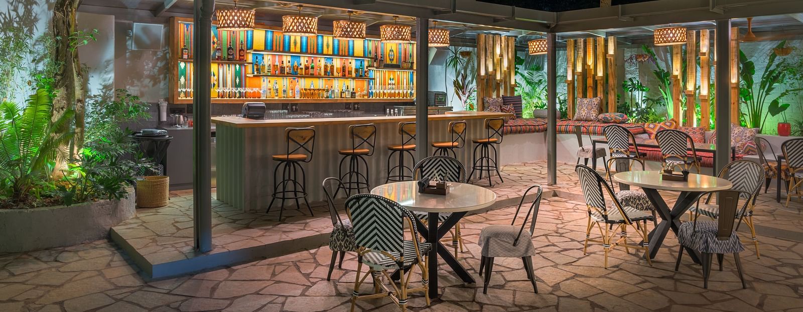 bar section with seating arrangements outside at Village 36