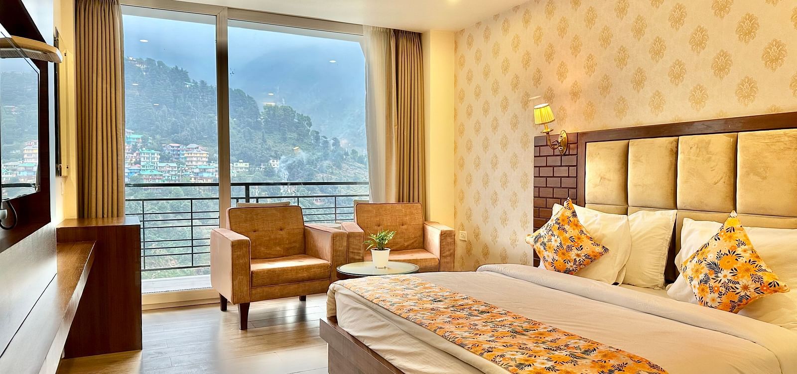 image of the premium room with balcony highlighting a beautiful mountain views from the huge windows - ZENQ SIGNATURE INN, MCLEODGANJ