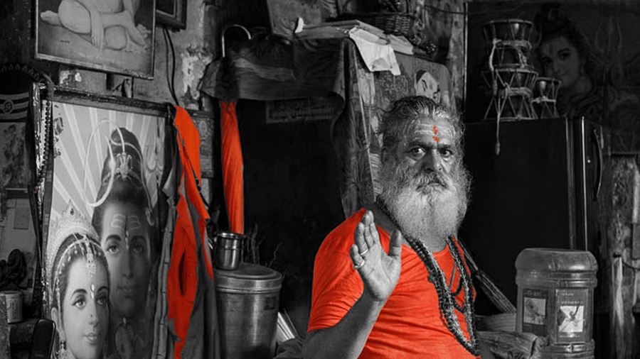 sadhu waving at the camera