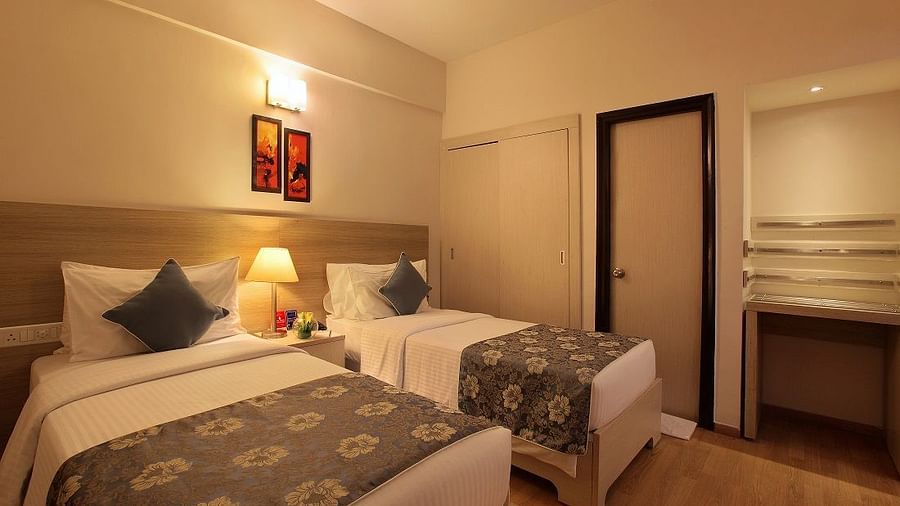 Premium room at Starlit Suites, Bangalore with twin beds