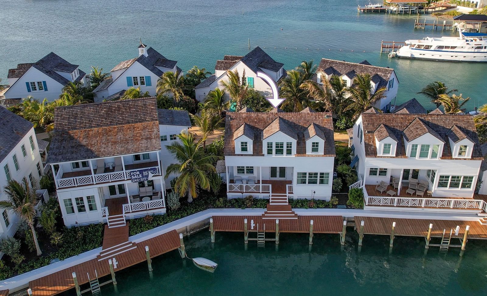 Aerial view of luxurious waterfront houses with private docs at Abaco Inn.
