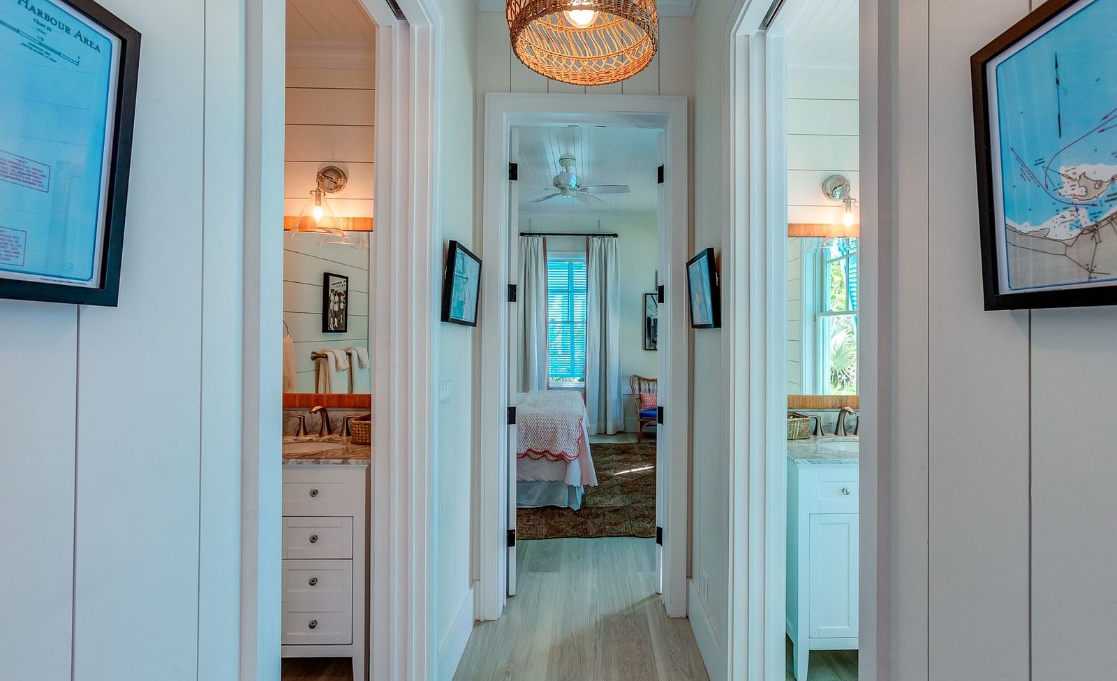 Hallway with hanging wicker light fixtures | Abaco Inn