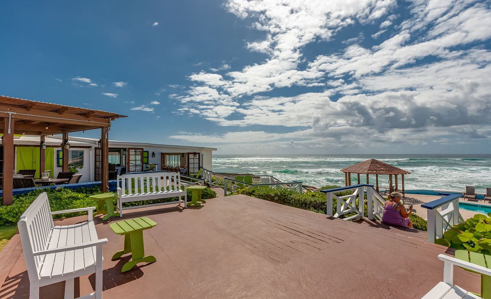 Brick-paved area with oceanfront view and patio seating | Abaco Inn