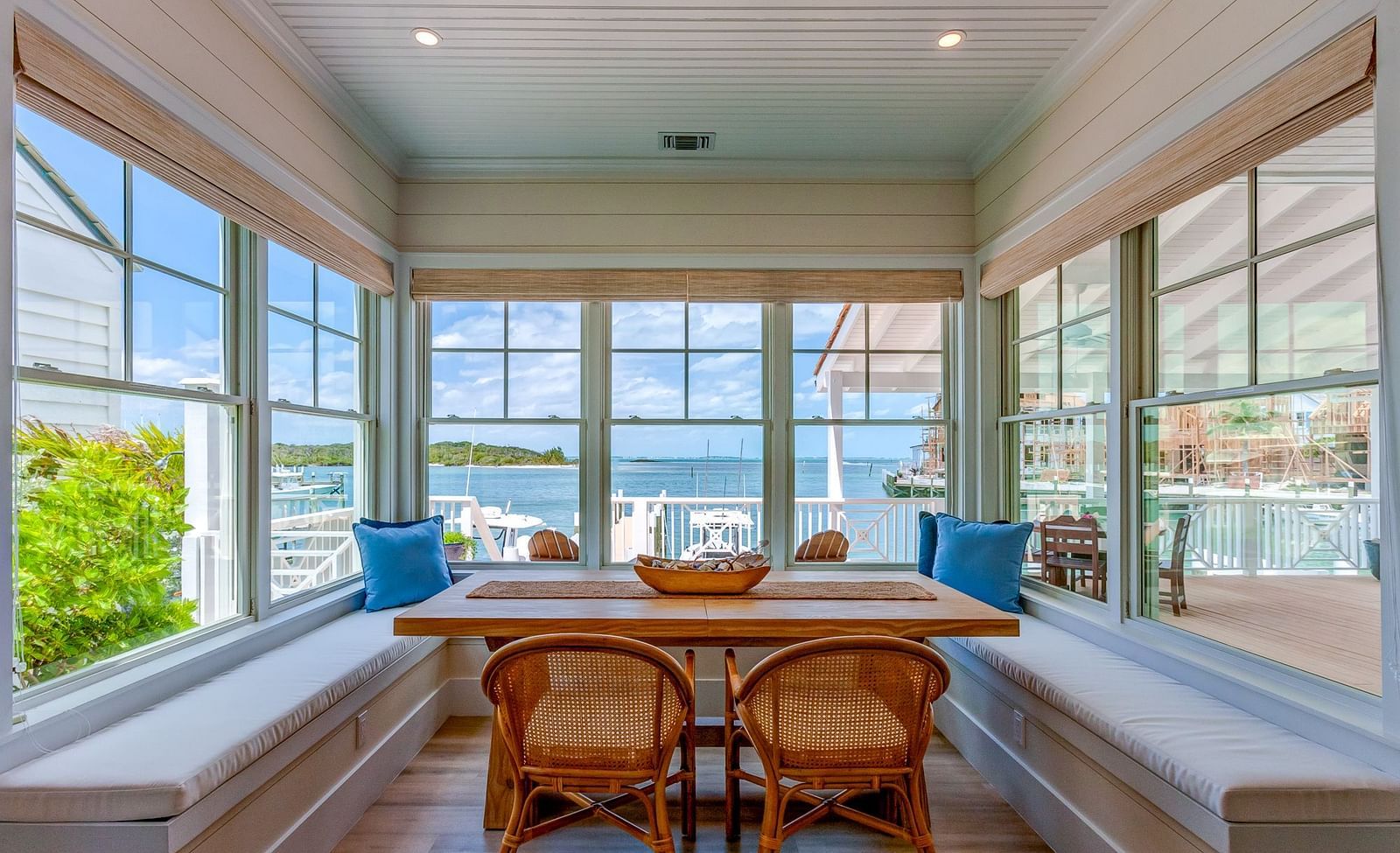 Window-side dining nook with a view of the water | Abaco Inn