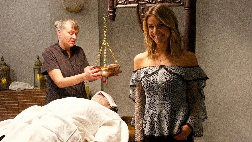 A man undergoing Ayurvedic therapy accompanied by a female