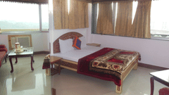 Hotel Taj Plaza Agra Taj Facing Superior Rooms with large windows and furniture