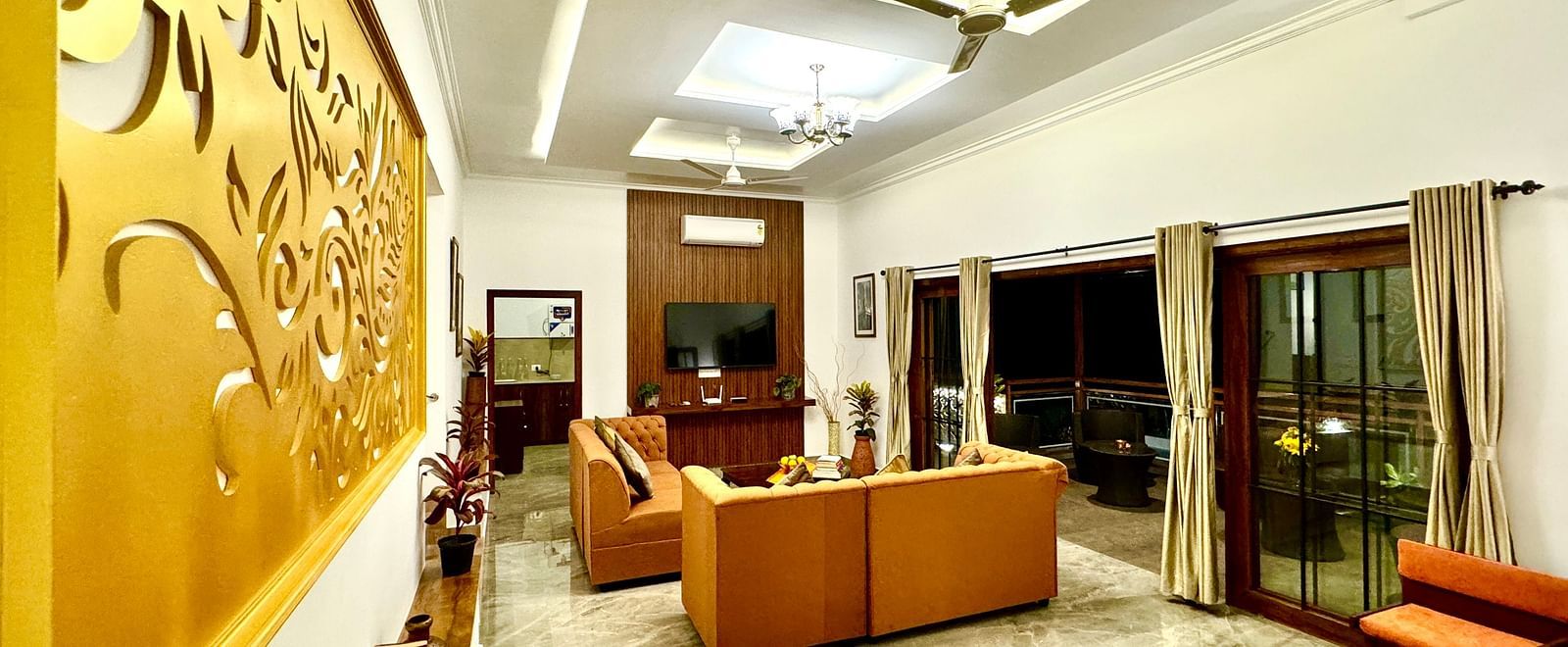 Stylish villa interior with modern lighting and comfortable seating arrangements - BluSalzz Collection - Tranquil Resort, Wayanad