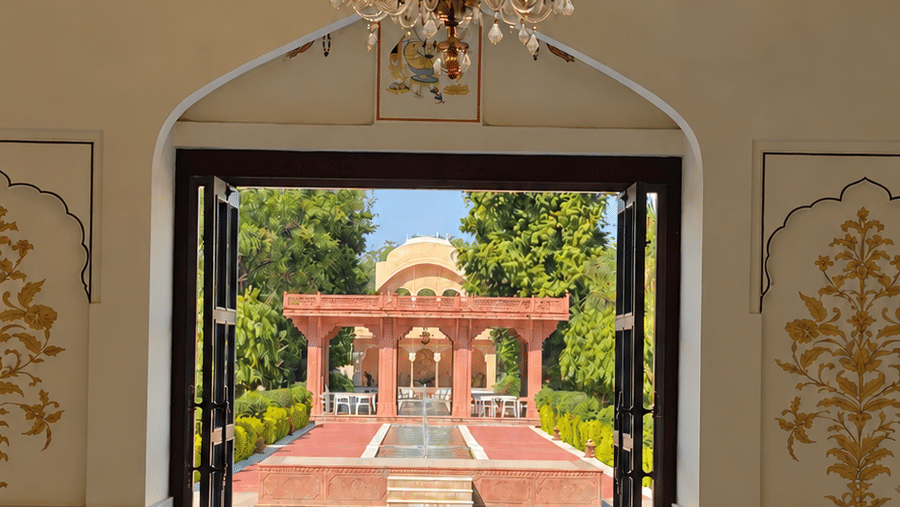 Lobby-Baradari-Fountain View-Sunlit marble hall overlooking a courtyard