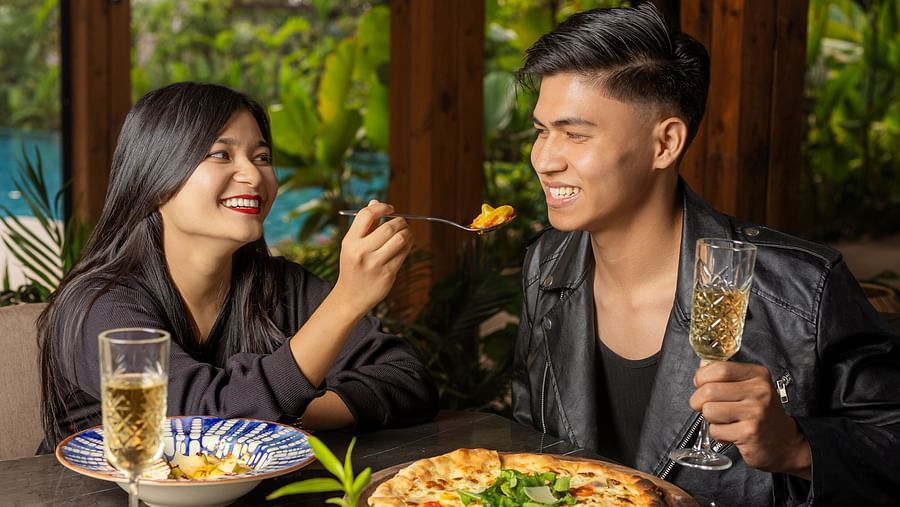 Couple enjoying a meal together at the scenic restaurant of The Dukes Retreat