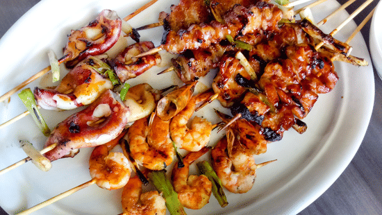 a plate of seafood and sauce