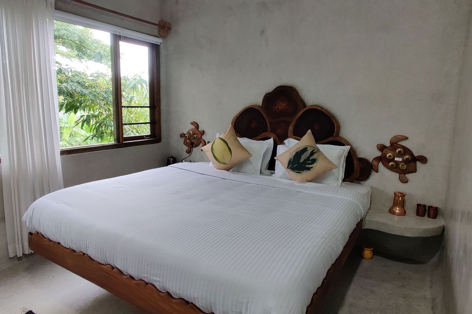 Albacore-1-King-size bed in the Deluxe Albacore Room, offering luxury and comfort for two guests.