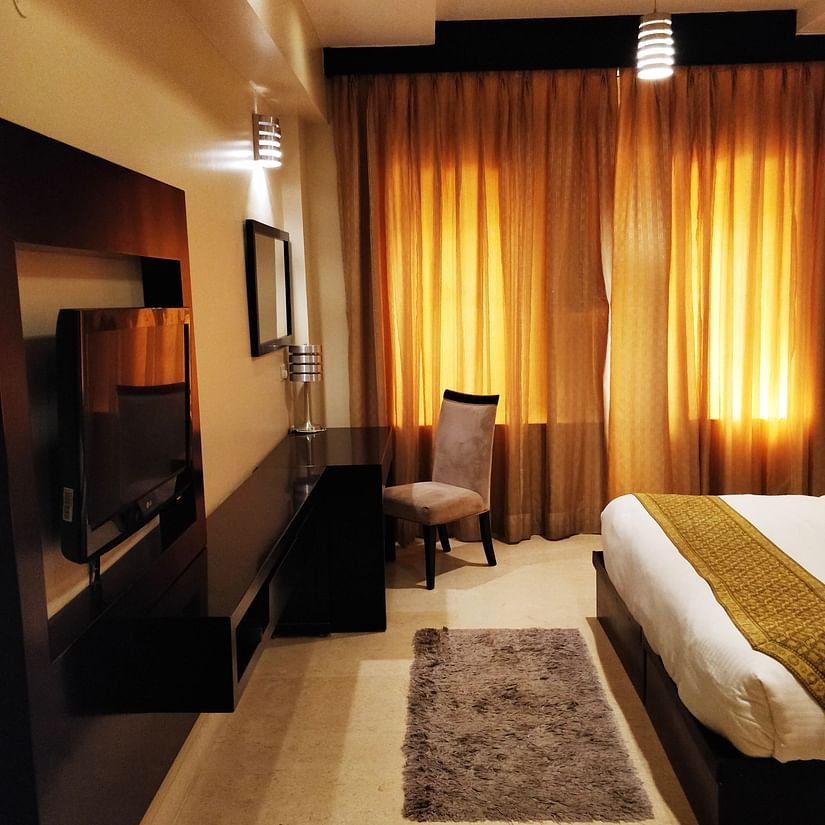 Superior King Room with large windows and bed Five Elements The Claire, Gurugram